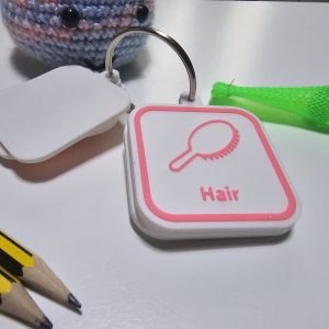 Hair visual routine tag with hairbrush icon for autism morning routine support.
