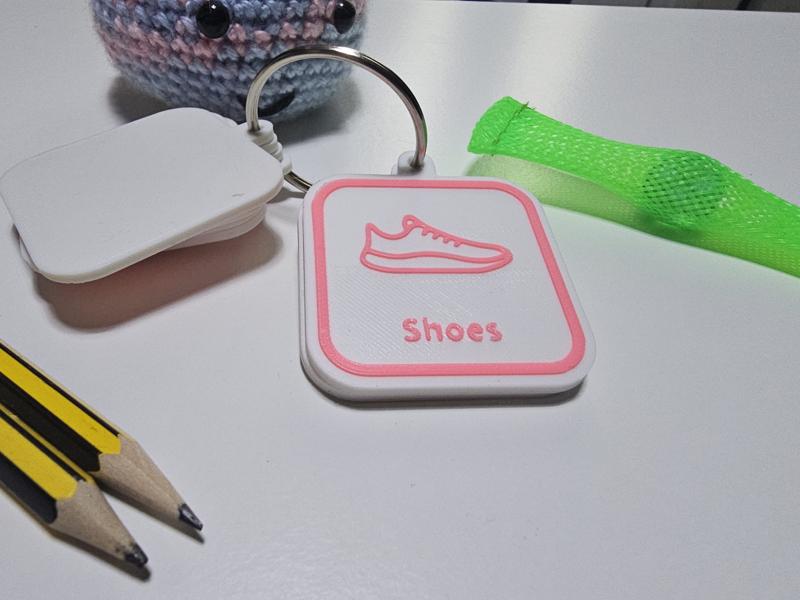 Shoes visual routine tag for helping children prepare for school mornings.