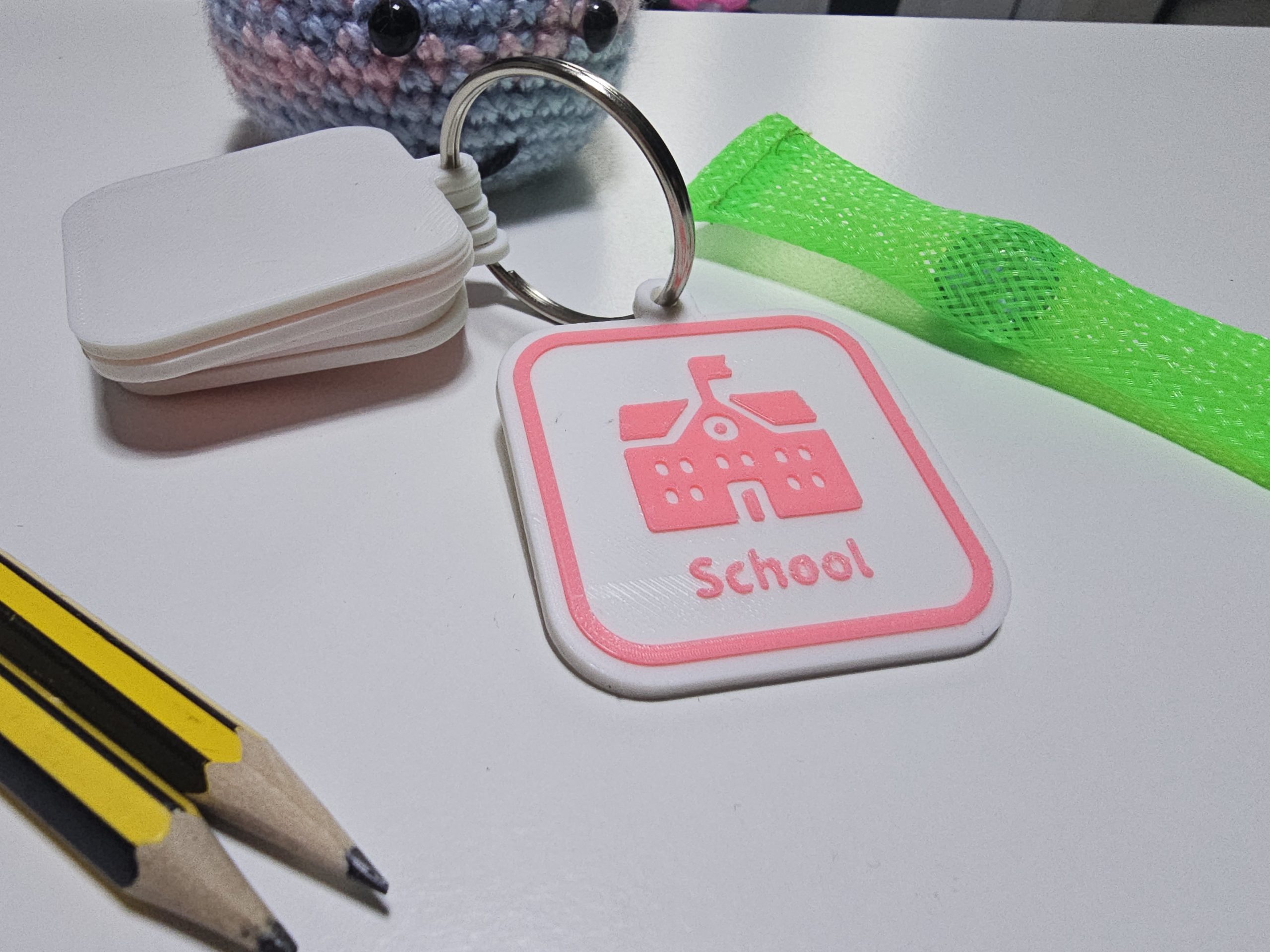 School visual communication tag with school icon for autism and SEN morning routine.